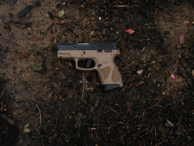 Katy Police said Cordell McCarter threw this 9mm pistol out of the car he was driving.